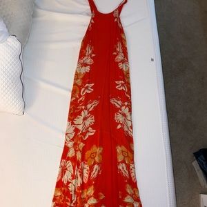 Orange low back and low sides dress